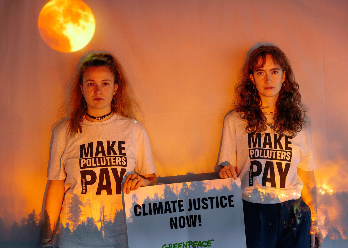 Projection Photo Booth with Climate Impacts at COP29 in Baku. © Marie Jacquemin / Greenpeace